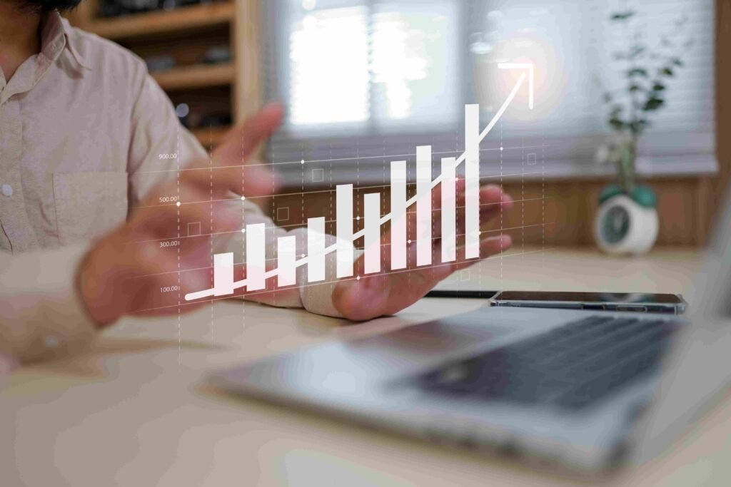 Euro banknotes, calculator, and financial reports spread across a desk
