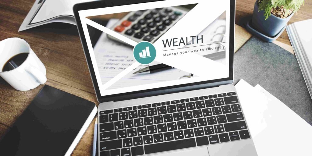 Laptop displaying a wealth management presentation on a desk with financial documents, a calculator, and a notebook