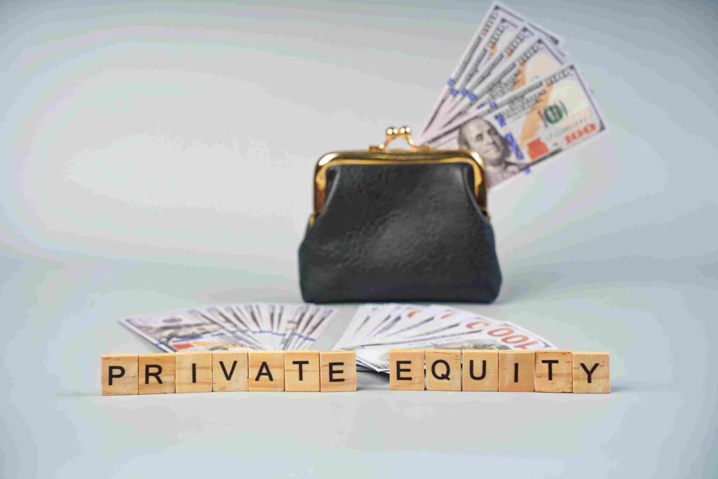 Wallet with cash and the words "Private Equity" displayed on letter blocks in front